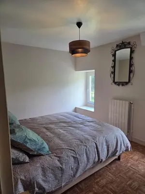 Un ou plusieurs lits dans un hébergement de l'établissement NESST - Gîte Horse & Dog Friendly Cottage