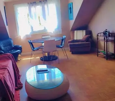 Coin salon dans l'établissement Maison familiale à Bugeat avec jardin accueillant