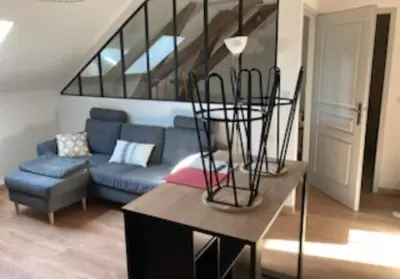 Coin salon dans l'établissement Location saisonnière Lot
