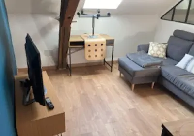 Coin salon dans l'établissement Location saisonnière Lot
