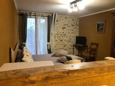 Un ou plusieurs lits dans un hébergement de l'établissement Ecuries de Saint Maurice- Maison d'hôtes de Gondou