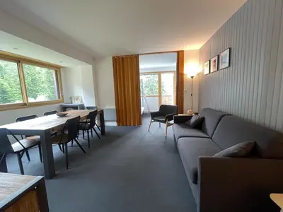 Coin salon dans l'établissement Superbe Appart aux pieds des pistes de ski avec balcon-parking et casier