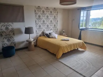 Un ou plusieurs lits dans un hébergement de l'établissement Brive, La Villa Bellevue