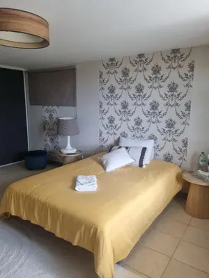 Un ou plusieurs lits dans un hébergement de l'établissement Brive, La Villa Bellevue