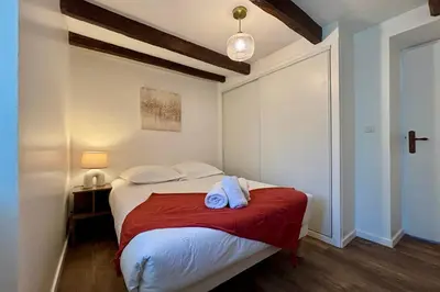 Un ou plusieurs lits dans un hébergement de l'établissement Casa Les Combes - Maison typique climatisé avec jardin