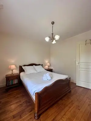 Un ou plusieurs lits dans un hébergement de l'établissement Maison de Perpezac - Jardin & Clim - 7 personnes - Perpezac-le-Noir