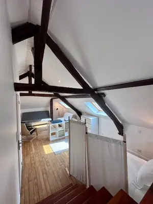 Un ou plusieurs lits dans un hébergement de l'établissement Maison de Perpezac - Jardin & Clim - 7 personnes - Perpezac-le-Noir