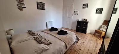 Un ou plusieurs lits dans un hébergement de l'établissement Grand gite familial 5 chambres à Ally, dans le Cantal à côté de Salers