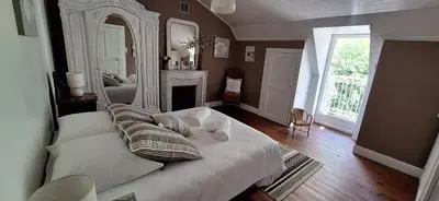 Un ou plusieurs lits dans un hébergement de l'établissement Grand gite familial 5 chambres à Ally, dans le Cantal à côté de Salers