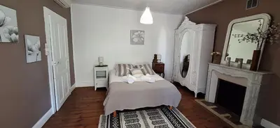 Un ou plusieurs lits dans un hébergement de l'établissement Grand gite familial 5 chambres à Ally, dans le Cantal à côté de Salers