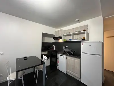 Cuisine ou kitchenette dans l'établissement Appartement mont dore 4 personnes