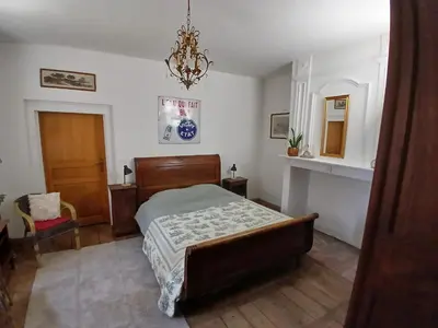 Un ou plusieurs lits dans un hébergement de l'établissement Manoir du Boscau, Jean Moulierat