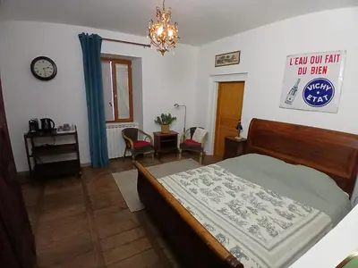 Un ou plusieurs lits dans un hébergement de l'établissement Manoir du Boscau, Jean Moulierat