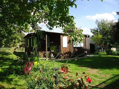 Jardin de l'établissement Chalet Vert 10 min à pied du centre ville d'Argentat-sur-Dordogne