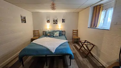 Un ou plusieurs lits dans un hébergement de l'établissement Appartement 200m carré mont dore