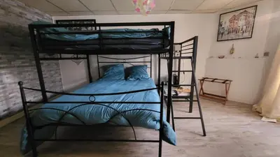 Un ou plusieurs lits dans un hébergement de l'établissement Appartement 200m carré mont dore
