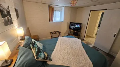 Télévision ou salle de divertissement dans l'établissement Appartement 200m carré mont dore