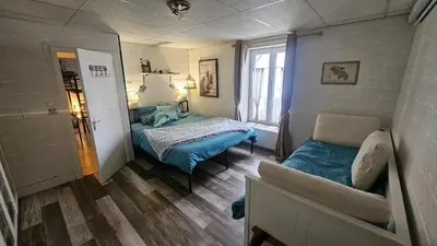 Un ou plusieurs lits dans un hébergement de l'établissement Appartement 200m carré mont dore