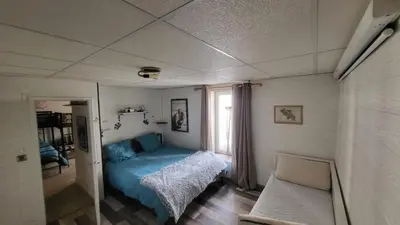 Un ou plusieurs lits dans un hébergement de l'établissement Appartement 200m carré mont dore