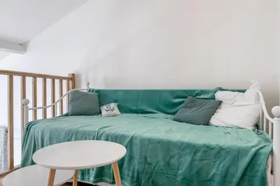 Un ou plusieurs lits dans un hébergement de l'établissement Le Duplex D'Andromely, Centre-historique-Animé