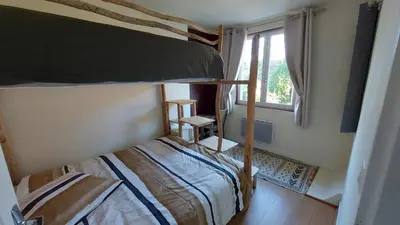 Un ou plusieurs lits dans un hébergement de l'établissement Les Chambres du Monteil - 1 à 5personnes