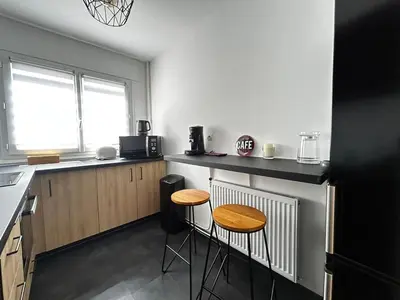 Cuisine ou kitchenette dans l'établissement Le Bénédictins, proche de la Gare