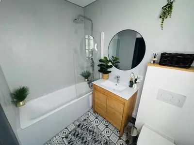 Salle de bains dans l'établissement Le Signature