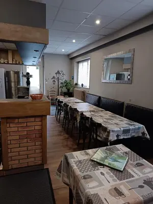 Restaurant ou autre lieu de restauration dans l'établissement Gite le Buron