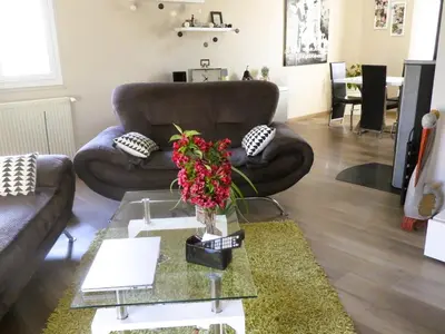 Coin salon dans l'établissement Le Grand Chêne