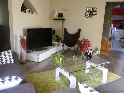 Télévision ou salle de divertissement dans l'établissement Le Grand Chêne