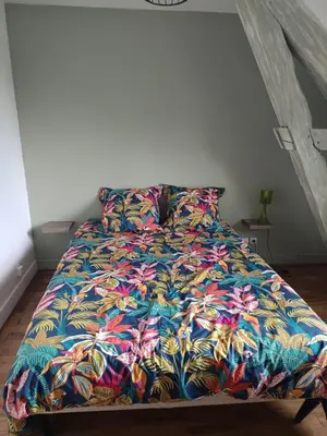 Un ou plusieurs lits dans un hébergement de l'établissement Grand appartement avec belle vue