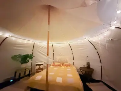 Un ou plusieurs lits dans un hébergement de l'établissement Nuit astrale en pleine nature