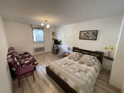 Un ou plusieurs lits dans un hébergement de l'établissement Bel appartement T3 avec balcon sud et wifi, proche pistes - FR-1-787-130