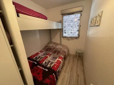 Un ou plusieurs lits dans un hébergement de l'établissement Bel appartement T3 avec balcon sud et wifi, proche pistes - FR-1-787-130