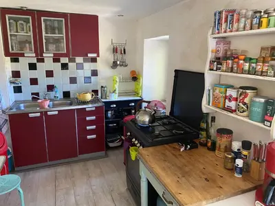 Cuisine ou kitchenette dans l'établissement Petite maison ancienne dans le lot