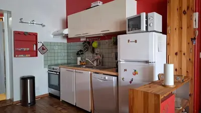 Cuisine ou kitchenette dans l'établissement Les Tomettes - Le Mont-Dore