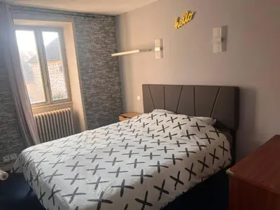 Un ou plusieurs lits dans un hébergement de l'établissement La Maison de Janine
