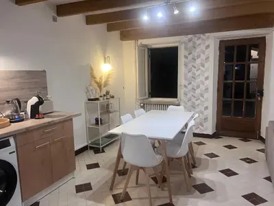 Cuisine ou kitchenette dans l'établissement La Maison de Janine