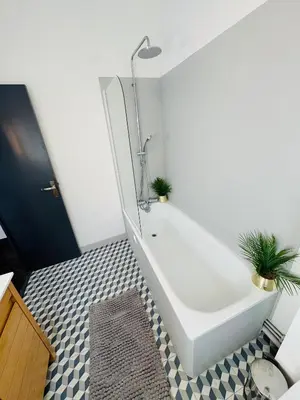Salle de bains dans l'établissement Le Pent House Limoges