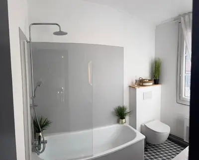 Salle de bains dans l'établissement Le Pent House Limoges