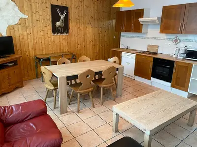 Cuisine ou kitchenette dans l'établissement Val-locations Sancy 4
