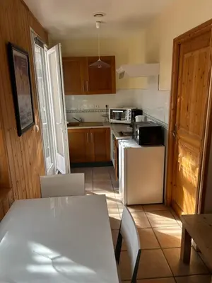 Cuisine ou kitchenette dans l'établissement Val-locations marmotte 5