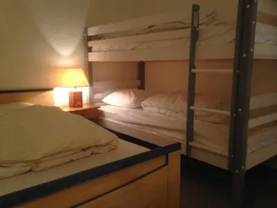 Un ou plusieurs lits dans un hébergement de l'établissement Résidence Azur Sancy