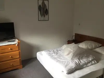 Un ou plusieurs lits dans un hébergement de l'établissement Résidence Azur Sancy