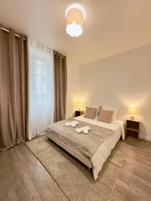 Un ou plusieurs lits dans un hébergement de l'établissement Studio 4 lumineux Av Garibaldi - DABNB