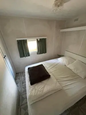 Un ou plusieurs lits dans un hébergement de l'établissement mobil home