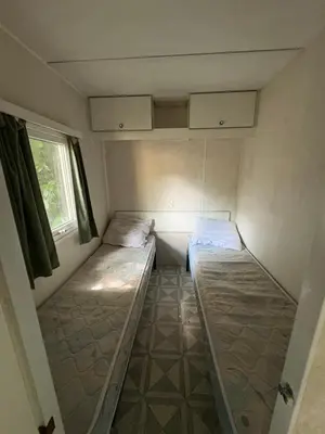 Un ou plusieurs lits dans un hébergement de l'établissement mobil home