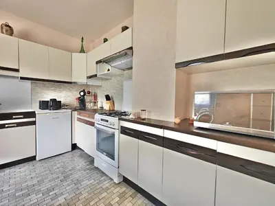 Cuisine ou kitchenette dans l'établissement La Clé des Champs, douce et raffinée