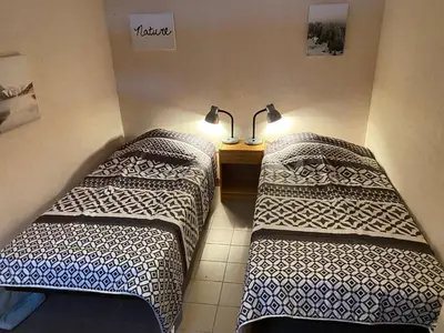 Un ou plusieurs lits dans un hébergement de l'établissement Val-locations sancy2