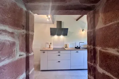 Cuisine ou kitchenette dans l'établissement Maison de la Fontaine - Typique - Bourg de Collonges